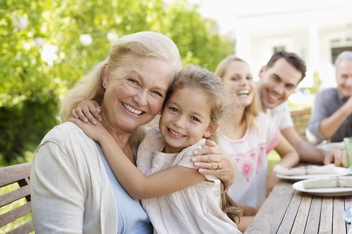 smiling woman with child